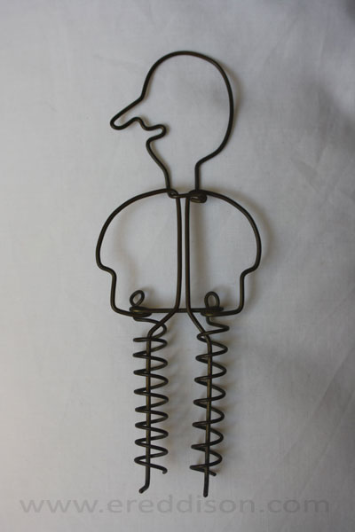 'The Merry Decapitation without Trousers' one of Eddison's childhood treasures, a German wire toy which is described by Lessingham in A Fish Dinner in Memison, chapter 17
